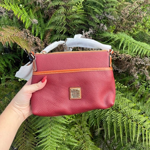 Dooney & Bourke Handbags - NWT Dooney & Bourke Pouchette • Wine